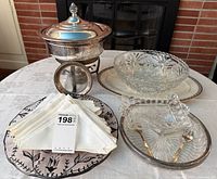 Overall lot showing fondue set, pressed glass pieces, Lenox platter, napkins