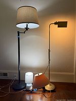 Group of four lamps showing sizes and styles together
