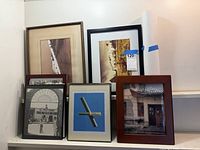 Group shot showing all six framed pieces plus rolled print