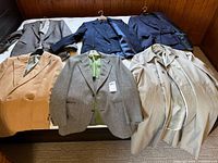 All six jackets and coats laid out for full view