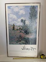 Monet The New Painting framed poster showing water damage at lower edge