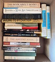 Box of books showing titles such as The Book About Books, Inventing the Middle Ages, Sailing to Byzantium, Ancient Religions and others