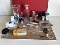 Full lot overview front angle showing all glassware and tools
