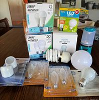 Group shot showing all boxed and loose bulbs, night lights, lantern