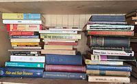 Shelf of mixed hardcover & paperback titles including language and science texts