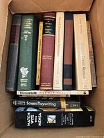 Box 1 with technical, philosophy and screenwriting titles visible