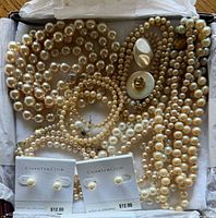 Box with six simulated pearl necklaces and two Charter Club stud earring pairs