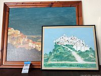 Both framed Emory Menefee paintings side by side