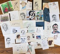 Full lot overview showing all artworks spread on floor