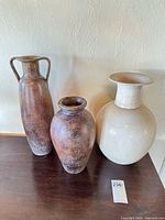 Group shot of all three vases showing relative sizes, colors, and finishes