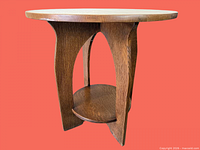 full view of round oak side table front angle