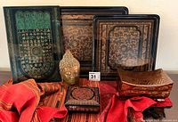 Entire lot with trays, boxes, Buddha head and textile displayed