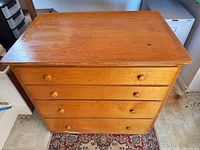 Top and front view of the solid wood 4-drawer dresser