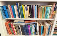 Two shelf rows filled with assorted science and chemistry books