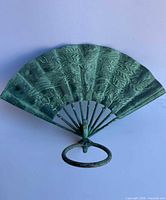 Front view showing fan panel design and patina