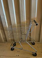 side view showing full cart structure and wheels