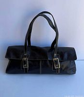 Full view of black Kenneth Cole Reaction shoulder bag front