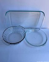 All three Pyrex clear glass baking pieces