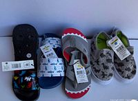 Group shot showing all four pairs with tags attached