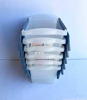 Stack of six Sterilite bins showing side profile and quantity