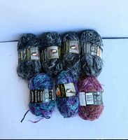 All seven yarn skeins grouped
