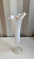 Front view of Northwood opalescent milk and clear glass Tree Trunk vase