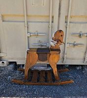 side view of full wooden rocking horse