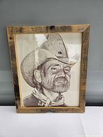 Front view of framed Willie Nelson portrait