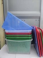 Front view showing stacked totes in various colours