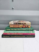Stack of five books side view