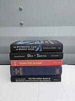 Front spines of all five stacked hardcovers