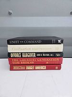 Front view of all five hardcover books stacked showing spines and titles