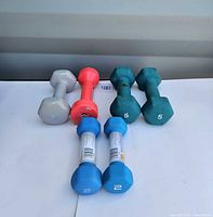 Six neoprene hex dumbbells assorted weights and colours