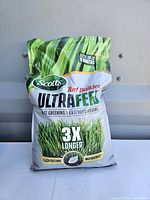 Front view of Scotts Turf Builder UltraFeed fertilizer bag