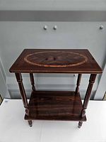 Top view showing oval inlay and wood grain