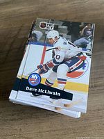 Stack of Pro Set hockey cards, top card Dave McLlwain