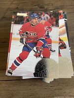 Stack of cards with top Donruss Montreal Canadiens player card visible