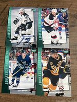Four Pinnacle rookie cards featuring Chris Gratton, Jim Dowd, Chris Pronger, Bryan Smolinski