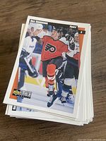 Stack of Upper Deck Collector's Choice hockey cards with Dale Hawerchuk card visible on top