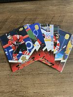 Front view of nine Tim Hortons Team Canada hockey cards fanned out, top card Claude Giroux