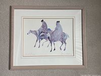 Full view of framed watercolor depicting two riders