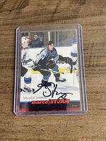 Front view of autographed Marco Sturm San Jose Sharks card in plastic holder
