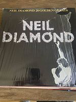 Front cover of Neil Diamond 20 Golden Greats LP in shrink wrap