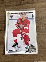Front of Upper Deck Rookie Report Nicklas Lidstrom hockey card in sleeve