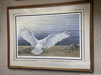 Full view of framed print on wall