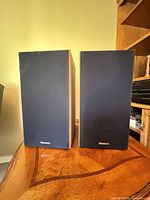 Front view of both Paradigm Phantom speakers with grilles