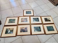 All nine framed prints laid out to show fronts and matching frames