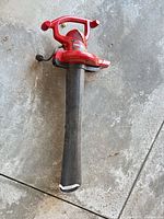 Full view of Toro Ultra Blower Vac with nozzle attached on concrete floor