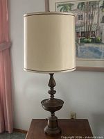 First end table front view with lamp on top