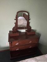 front view showing dresser, mirror, drawers